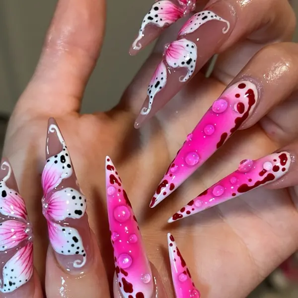 Nail work by Tessa’s Talons