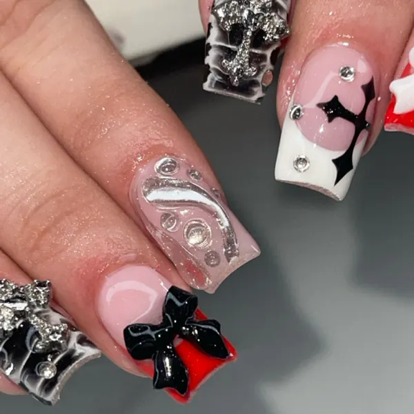 Nail work by Tessa’s Talons