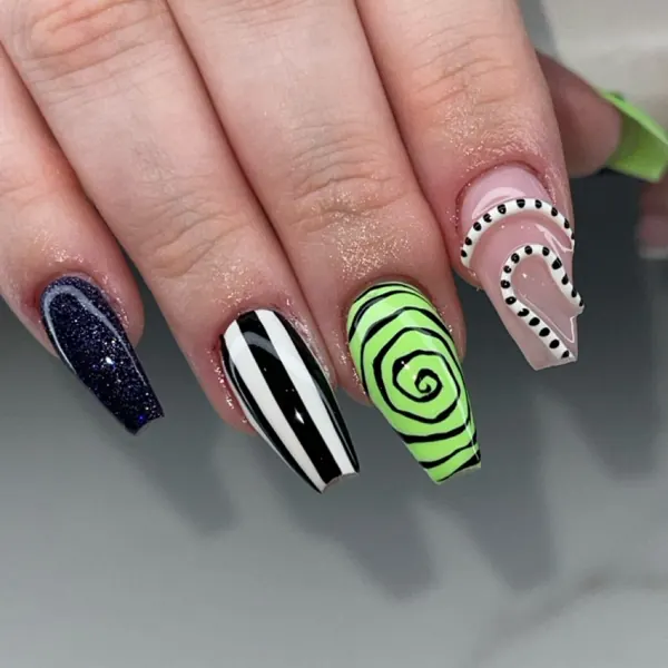 Nail work by Tessa’s Talons