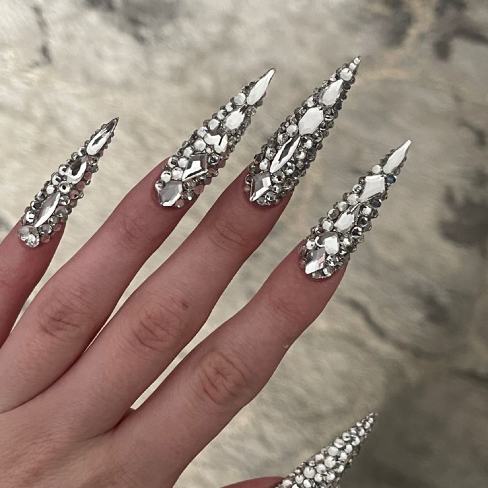 Nail work by Tessa’s Talons