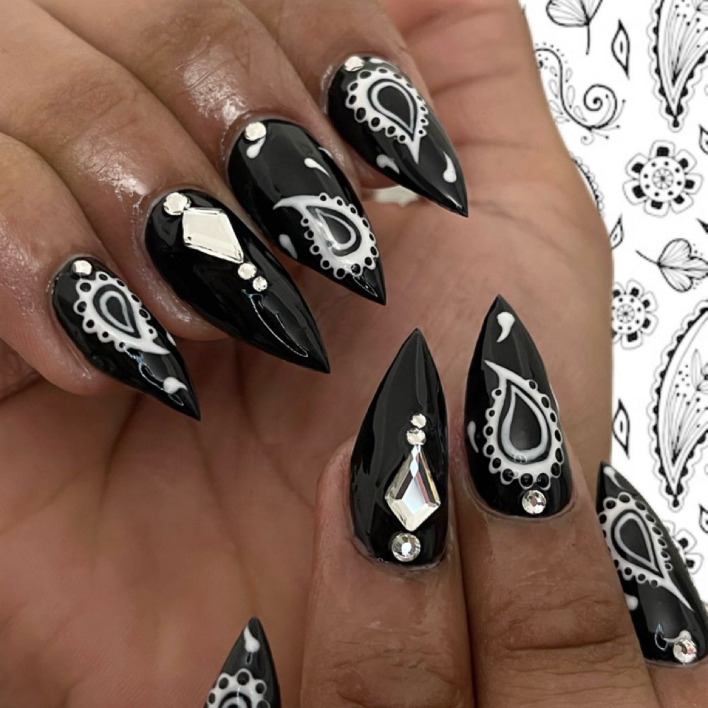 Nail work by Tessa’s Talons